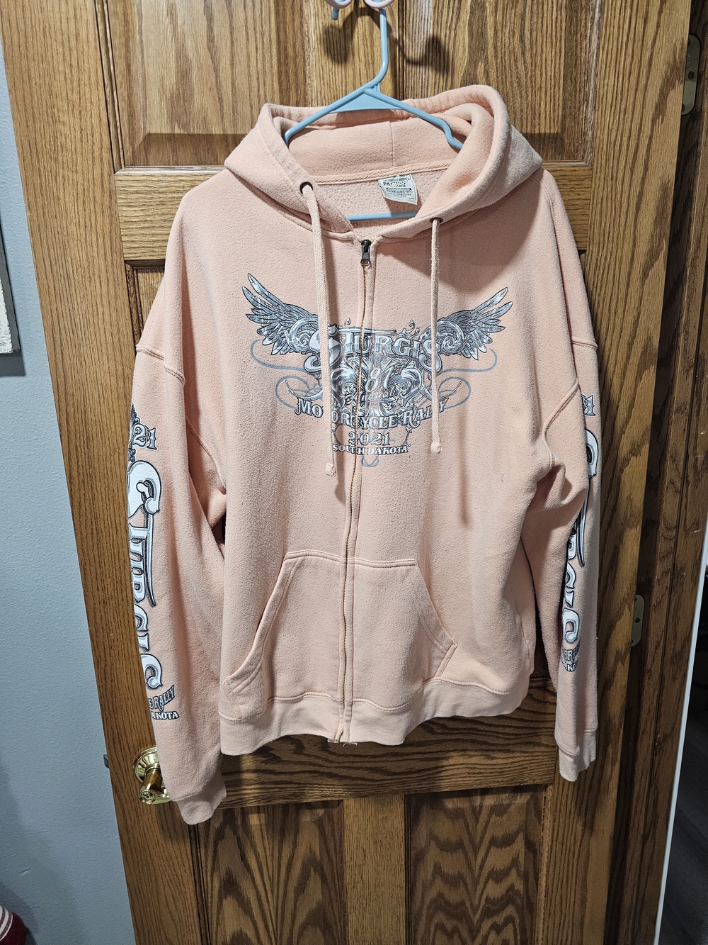 Peach Zip-Up Hoodie with Winged Graphic Sturgis